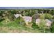 Aerial view of the home featuring lush landscaping, and an expansive backyard at 51 Falcon Hills Dr, Highlands Ranch, CO 80126