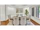 Elegant dining room featuring a stylish table, seating for six, with refined wall art at 51 Falcon Hills Dr, Highlands Ranch, CO 80126