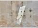 The upgraded shower boasts multiple shower heads and a tiled surround at 51 Falcon Hills Dr, Highlands Ranch, CO 80126