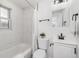 Clean bathroom featuring marble tile and modern fixtures at 4441 E Montana Pl, Denver, CO 80222