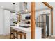 Modern kitchen with white shaker cabinets and stainless steel appliances at 4441 E Montana Pl, Denver, CO 80222