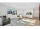 Spacious living room with hardwood floors and plenty of natural light at 4441 E Montana Pl, Denver, CO 80222