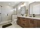 Bathroom with a walk-in shower and double sink vanity at 4125 Tejon St, Denver, CO 80211