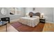 Bright bedroom featuring natural light, a cozy rug, and stylish, neutral decor at 4125 Tejon St, Denver, CO 80211