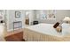 Bedroom showcasing natural light, light grey walls, and wood flooring at 4125 Tejon St, Denver, CO 80211