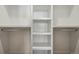 Walk-in closet with built-in shelves and hanging rods, perfect for organized storage at 4125 Tejon St, Denver, CO 80211