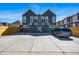 Rear exterior of home featuring parking, landscaping, and contemporary design at 4125 Tejon St, Denver, CO 80211