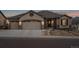 Charming home with three-car garage, stone accents and covered front entry at 2891 Waterfront Dr, Monument, CO 80132