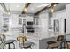 Spacious kitchen with granite countertops, stainless steel appliances, and a large island with bar seating at 2891 Waterfront Dr, Monument, CO 80132