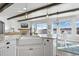 Open concept kitchen with granite countertops and views of the lake at 2891 Waterfront Dr, Monument, CO 80132