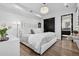 Serene bedroom with a chandelier and walk-in closet at 562 Steele St, Denver, CO 80206
