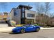 Modern home with sleek architectural design, large windows, and well-maintained landscaping at 562 Steele St, Denver, CO 80206