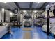 Luxury garage with multiple car lifts at 562 Steele St, Denver, CO 80206