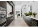 Spacious chef's kitchen showcasing modern appliances and ample storage at 562 Steele St, Denver, CO 80206