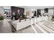 Sleek living room featuring a fireplace, modern furnishings, and stylish decor at 562 Steele St, Denver, CO 80206