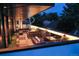 Inviting rooftop deck featuring a fire pit, comfortable seating, and views at 562 Steele St, Denver, CO 80206