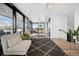 Comfortable seating and access to multiple balconies overlooking the city at 562 Steele St, Denver, CO 80206