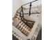 Modern staircase with open treads, glass railing, and integrated lighting at 562 Steele St, Denver, CO 80206