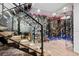 Wine cellar with glass enclosed shelves, adjacent to staircase at 562 Steele St, Denver, CO 80206