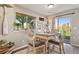 Bright breakfast nook with natural light and views of the large backyard at 2550 Gold Creek Dr, Elizabeth, CO 80107
