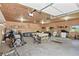 Large garage featuring ample space for parking, storage, and hobbies, enhanced by natural light and a functional layout at 2550 Gold Creek Dr, Elizabeth, CO 80107