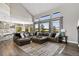 Spacious living room with high ceilings, lots of windows, and an open floor plan at 2550 Gold Creek Dr, Elizabeth, CO 80107