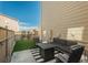 This backyard features a cozy seating area with a fire pit and artificial turf for easy maintenance at 2907 Distant Rock Ave, Castle Rock, CO 80109