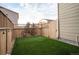 A low-maintenance backyard features artificial turf and stylish outdoor lighting at 2907 Distant Rock Ave, Castle Rock, CO 80109