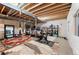 Unfinished basement with exposed ceiling, fitness equipment, and storage solutions at 2907 Distant Rock Ave, Castle Rock, CO 80109