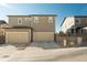 Two-story home featuring a two car garage and driveway with neutral paint to match all styles at 2907 Distant Rock Ave, Castle Rock, CO 80109