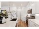 Stylish kitchen with a modern island, stainless steel appliances, white countertops and ample storage at 2907 Distant Rock Ave, Castle Rock, CO 80109