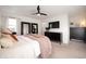 Spacious main bedroom featuring a ceiling fan, and large windows allowing for natural light at 2907 Distant Rock Ave, Castle Rock, CO 80109