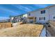 The large backyard is fenced in with a pergola and patio for outdoor living at 147 Silver Rock Trl, Castle Rock, CO 80104