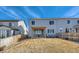 The home features a large, fenced backyard with a pergola and patio for outdoor entertaining at 147 Silver Rock Trl, Castle Rock, CO 80104