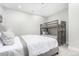 A cozy bedroom featuring carpet, a bunk bed, and a queen bed at 10524 Eby Cir, Lone Tree, CO 80124