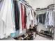 Walk-in closet with ample storage, shelving, and plenty of space for shoes and clothes at 10524 Eby Cir, Lone Tree, CO 80124