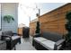 Patio featuring a grill, modern seating, and string lights for ambience at 10524 Eby Cir, Lone Tree, CO 80124