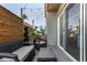 Cozy patio with outdoor seating and a sliding door to the interior at 10524 Eby Cir, Lone Tree, CO 80124