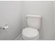 Clean, white toilet in a well-lit bathroom featuring classic fixtures and design at 10524 Eby Cir, Lone Tree, CO 80124