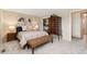 Comfortable bedroom with warm colors and stylish furniture at 6293 Ponderosa Way, Parker, CO 80134