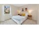 Bright bedroom featuring carpeted floors, natural light and mid-century modern furniture at 6293 Ponderosa Way, Parker, CO 80134