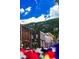Charming street featuring historic buildings and stores under a bright blue sky in a mountain town at 2152 Bighorn Rd # 202, Georgetown, CO 80444