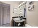 Well-maintained bathroom with a classic vanity, ample storage, and bright lighting for a fresh, clean feel at 6009 Yarrow St # B, Arvada, CO 80004