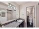 Stylish bathroom features modern fixtures, a sleek countertop, and a convenient layout for everyday comfort at 6009 Yarrow St # B, Arvada, CO 80004