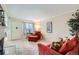 Inviting living room featuring a fireplace and a large window at 6009 Yarrow St # B, Arvada, CO 80004