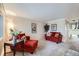 Inviting living room with plush carpeting and a cozy seating arrangement at 6009 Yarrow St # B, Arvada, CO 80004