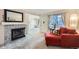 Comfortable living room with fireplace and ample room for seating at 6009 Yarrow St # B, Arvada, CO 80004