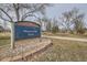 Sign for the City of Arvada Memorial Park with mature trees in the background at 6009 Yarrow St # B, Arvada, CO 80004
