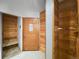 Functional entryway with tiled floors and wood accents for storage at 305 S Park Ave # 402, Breckenridge, CO 80424