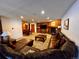 Cozy living area with comfortable sofas, fireplace, and dining area at 305 S Park Ave # 402, Breckenridge, CO 80424